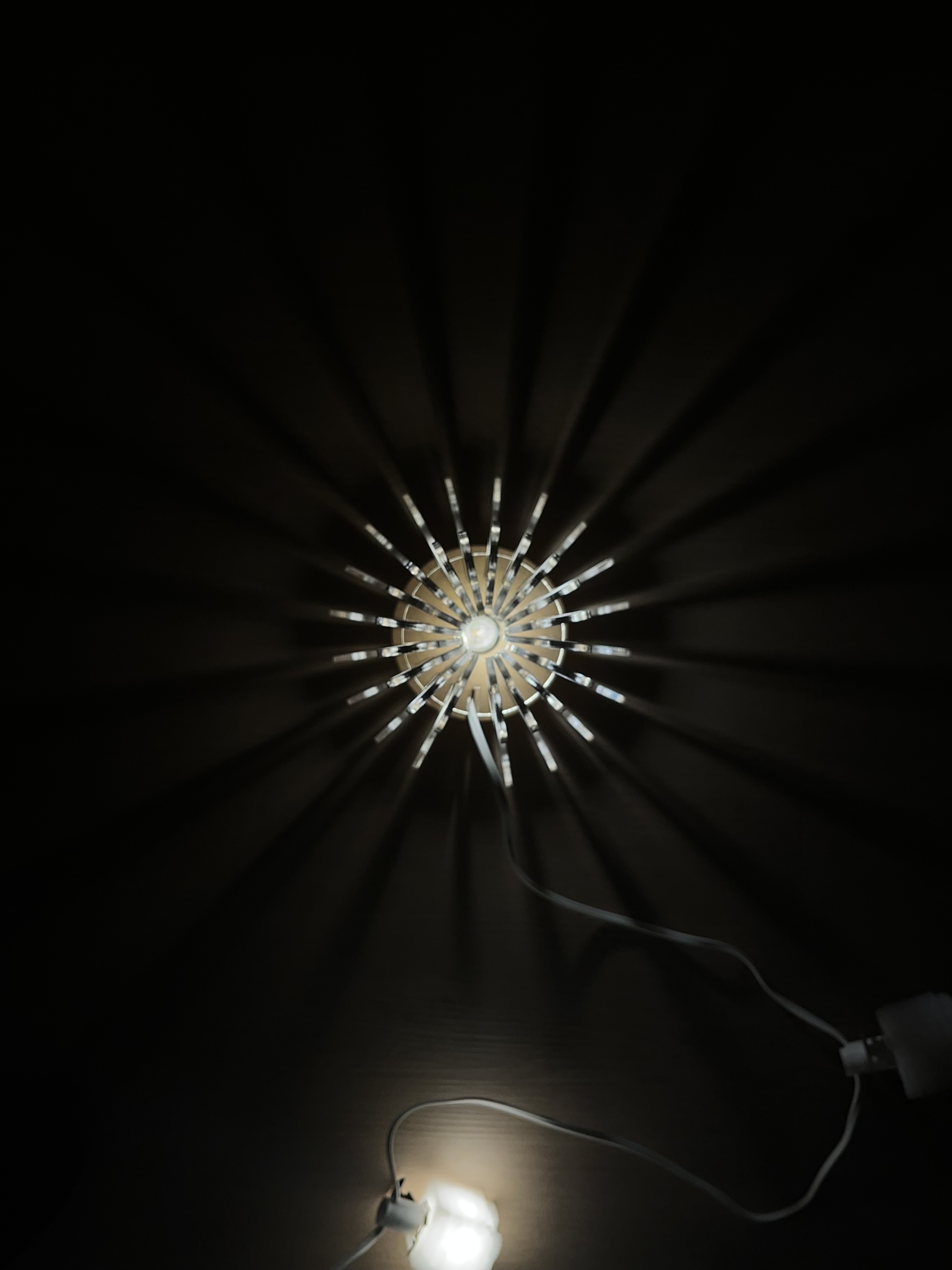 The finished, illuminated laser-cut acrylic lamp