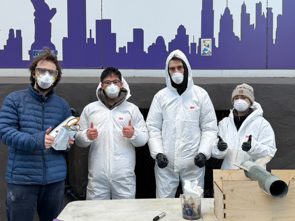 Rogue Aerospace team with rocket components